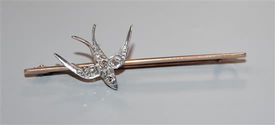 A late Victorian yellow and white metal, rose cut diamond set swallow bar brooch, 52mm.